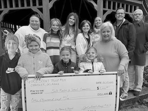 Front Row (Left to Right): Adalyn Jo Petrie, Nova Strickland, Chloe Crouch, Sophie Riggin, Safe Routes Committee Member Diann Herrmann Back Row (Left to Right): Kallie Jo Petrie, Tatum Crouch, Cali Hilgenfeld, Madelyn Ledford, Robin Couch, Safe Routes Committee Member Matt Radcliffe, Chandler School Board Member Mike Christy. Not pictured: Emma Wells and Saylor Dietz