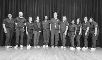 Recent grads of Central Tech’s Surgical Technology program celebrate after graduation. Among them is Aaliyah Fowler from Chandler. From left to right, Hannah Brave, Hominy; Kallen Johnson, Harrah; Sophia Wilkett, Tryon; Ashlynn Mitchell, Stillwater; Aimee Laymance, Stillwater; Todd Prough, Instructor; Alexis Lumly, Sapulpa; Ashawntae Boyd, Cushing;Aaliyah Fowler, Chandler;Abbiegail Prill, Terlton; Brinley Pritchard, Bristow. Photo/Central Tech