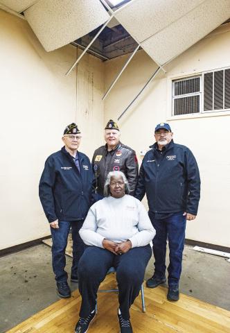 Members of the American Legion and American Legion Auxiliary pose in their building, known as The Hut. The groups face a crossroads as they decide how to proceed with the historic building that has been a Chandler mainstay for over eight decades. Picture are Nellie Caldwell (seated) and (standing, left to right) Walter Hughey, George Hicks and Kirk Holloway. Photo/Brian Blansett