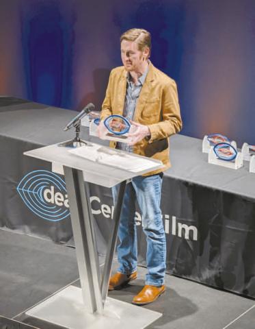 Jacob Snovel accepts the award for Best Oklahoma Feature for the film “Anywherwe” at the deadCenter Film Festival in Oklahoma City on Saturday. Photo/Jennifer Pryor