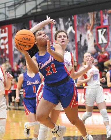 Jaelynn Robertson (21) puts up a shot in the lane during Chandler’s regionals finals matchup with Chisholm Saturday night. Photo/Brian Blansett