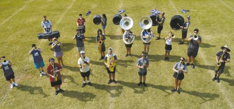 Photo/Emily Kalka The Pride of Chandler marching band prepares its new program - “The Ballad of Georgia Graves” - on the final day of their band camp on Aug. 8. Later that day, the band held a public preview for friends and family later that afternoon.