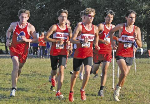 The lead group at the 66 Conference cross country meet last week included from left, Rhett Haley, Chandler (6808); Kendall Shawnee, McLoud (7154); Boyd Hamby, McLoud (7072); Mark O’Keefe, Chandler (6811) and Ryan Copeland, McLoud (7071). Photo/Shelley Haley