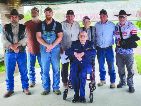 Veterans who attended the Meeker Memorial Day ceremonies include, from left, Ed Walker, Terry Devereaux, Jacob Walker, Mike Steele, Frank Ramseyer, Todd Walker and Dick Lee Sr. Sitting: Oscar Randall
