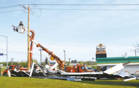 The Shell station near the intersection of Hwy 18 and Westech Road north of Shawnee received damage from a tornado on Friday night. Outside of the awning, the storm mostly caused tree damage according to authorities. The tornado was estimated to be an EF1, according to the National Weather Service. Photo/Brian Blansett